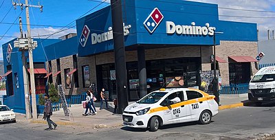 In which country does Domino's have the second-highest number of stores?
