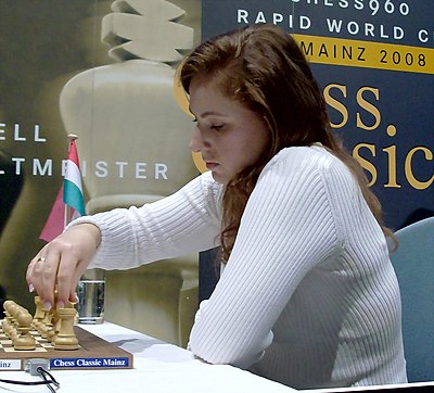 When did Polgár first enter the top ten of all chess players?