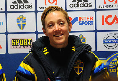 When did Sjögran make her debut for the Swedish national team?