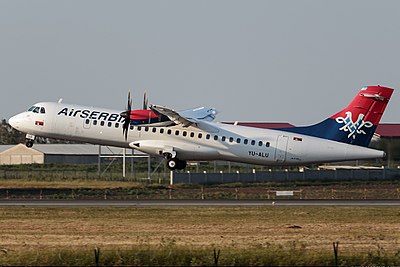 What is the official language of the country where Air Serbia is based?