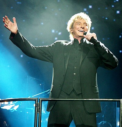 How many records has Barry Manilow sold worldwide?