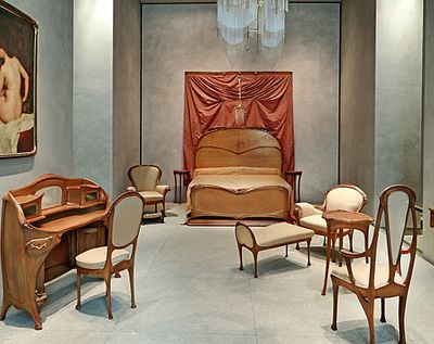 Which museum contributed to Guimard's revived reputation by acquiring his works?