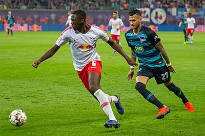 Who partnered Konaté in the center of RB Leipzig's defense frequently?