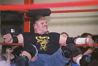What is the name of Raven's signature drop toe hold onto an opened steel chair?