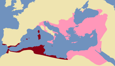 Who divided the Roman Empire between his two sons in 395 AD?