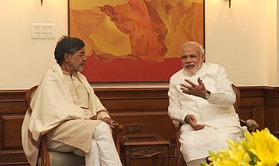 What significant event did Satyarthi lead in 1998?