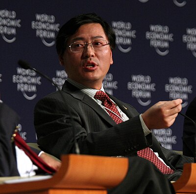 What leadership role did Yang Yuanqing hold at Lenovo before becoming CEO?