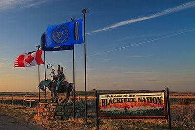 Which two creeks form part of the eastern and southern borders of the Blackfeet Indian Reservation?