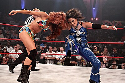 Which year did Christy enter the TNA Knockouts Tag Team Championship?