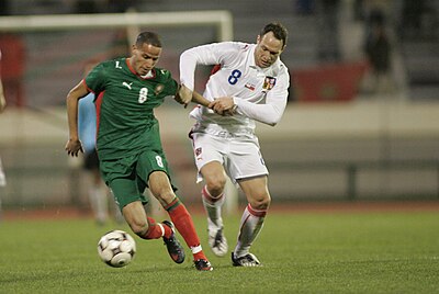 What position did Karim El Ahmadi play in football?