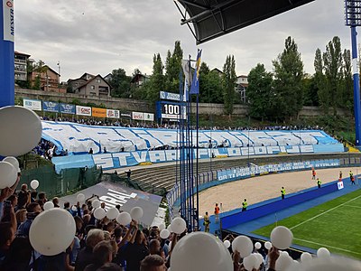 What is the name of the stadium where F.K. Željezničar Sarajevo plays?