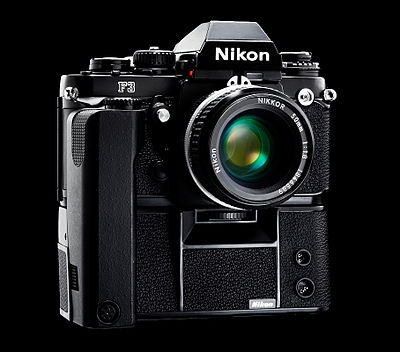 What is the name of Nikon's imaging lenses?