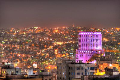 Which city is Amman most popular for multinational corporations to set up their regional offices, alongside?