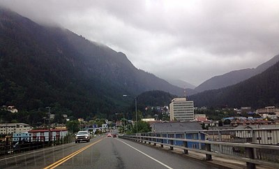 Which state capital is the only other one not connected by road to the rest of North America, like Juneau?