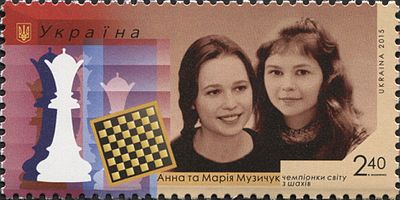 What is Anna Muzychuk's FIDE title?