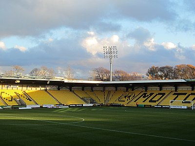 To which division was Livingston F.C. demoted in 2009 due to financial problems?
