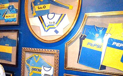 Which famous Argentine international player is a product of Boca Juniors' youth academy?