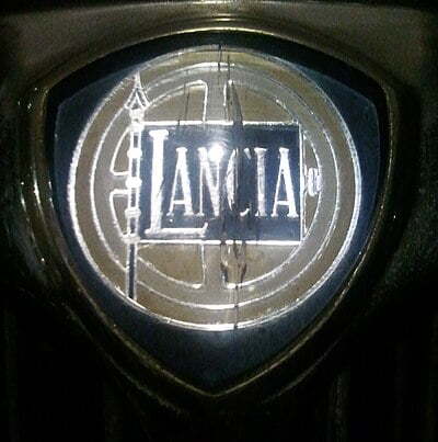 In what year did Lancia stop selling cars outside of Italy?