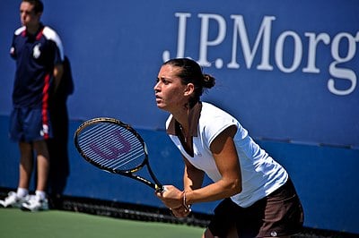 When did Flavia Pennetta become the world No. 1 in doubles?
