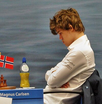 Against whom did Carlsen defend his classical world title in 2016?