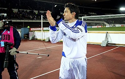 Unfortunately, Jari Litmanen's career at which club was marred by his sitting on the bench frequently?