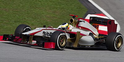 Which team was Pedro de la Rosa driving for when he got his podium finish in 2006?