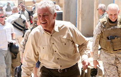 What was Chuck Hagel's position at American Information Systems ?