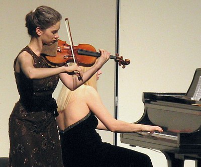 Which work for violin and piano did Lera Auerbach compose for Hilary?