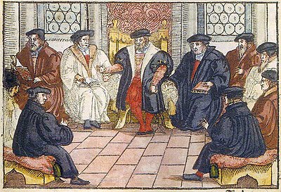 What was the outcome of Zwingli's meeting with Luther at Marburg Colloquy?