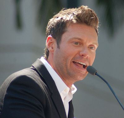 What popular singing competition show does Ryan Seacrest host?