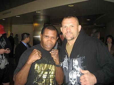 What collegiate sport did Chuck Liddell compete in?