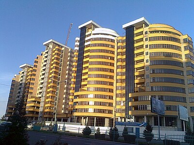 Shymkent is located how many kilometers west of Almaty?