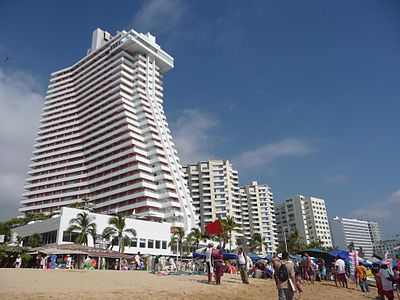 What is the name of the luxury high-rise hotel and condominium area in Acapulco?