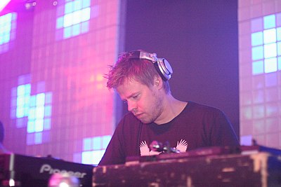 What's another alias of Ferry Corsten?