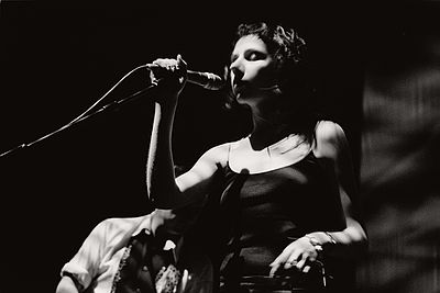 Which band did PJ Harvey join in 1988?