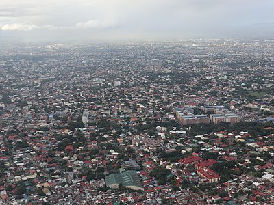 What is the name of the business district development in Parañaque?