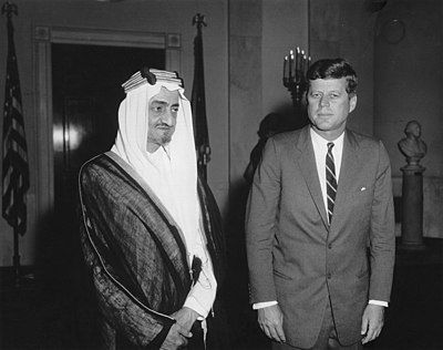 What is King Faisal Bin Abdulaziz Al Saud's native language?