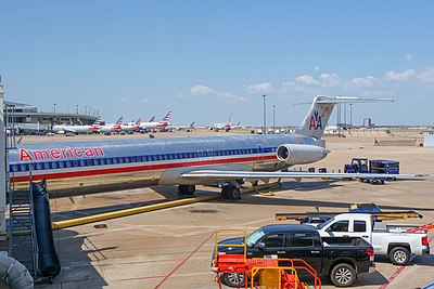 How many passengers does American Airlines handle annually?