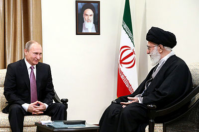 What is Ali Khamenei's role in Astan Quds Razavi?