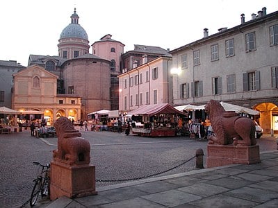 What is the main administrative division that Reggio Emilia belongs to?