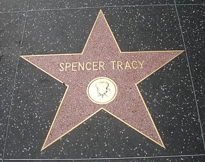 Which film did Spencer Tracy receive high praise for during his time at Fox?