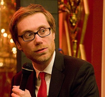 Stephen Merchant made his debut in theatre with which play?