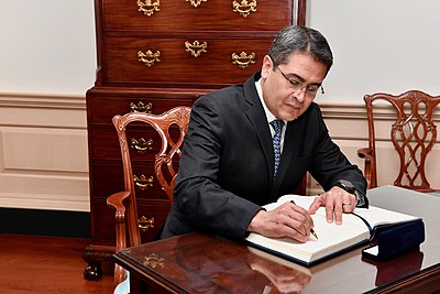 How many terms did Hernández serve as President of Honduras?