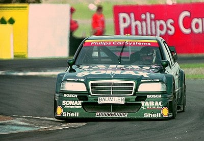 What is the full name of Bernd Schneider, the German racing driver?