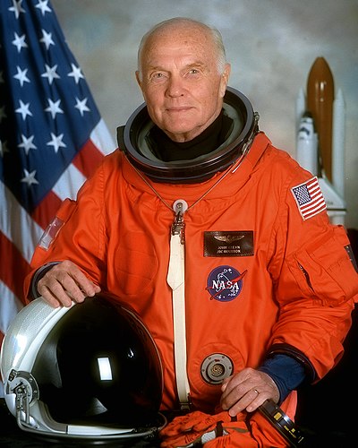 Which missions John Glenn has entered as an astronaut?[br](Select 2 answers)