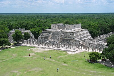 When did the state of Yucatán purchase the land under the monuments of Chichen Itza?