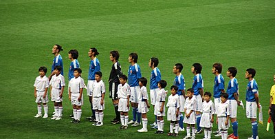 Which country does Japan National Football Team represent in sports?