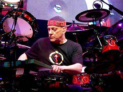 When did Neil Peart retire from touring?