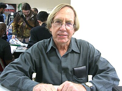 Which comic was Roy Thomas known for writing?