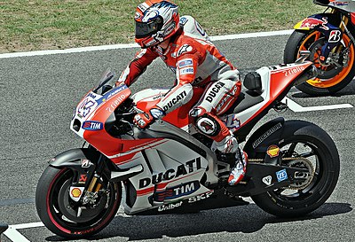 For which team did Dovizioso achieve six podiums and earned a move to Factory Ducati Team?